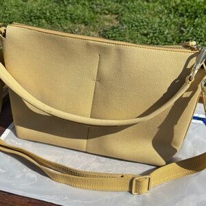 Rothy’s Golden Wheat “The Daily” Crossbody Bag with Adjustable Strap